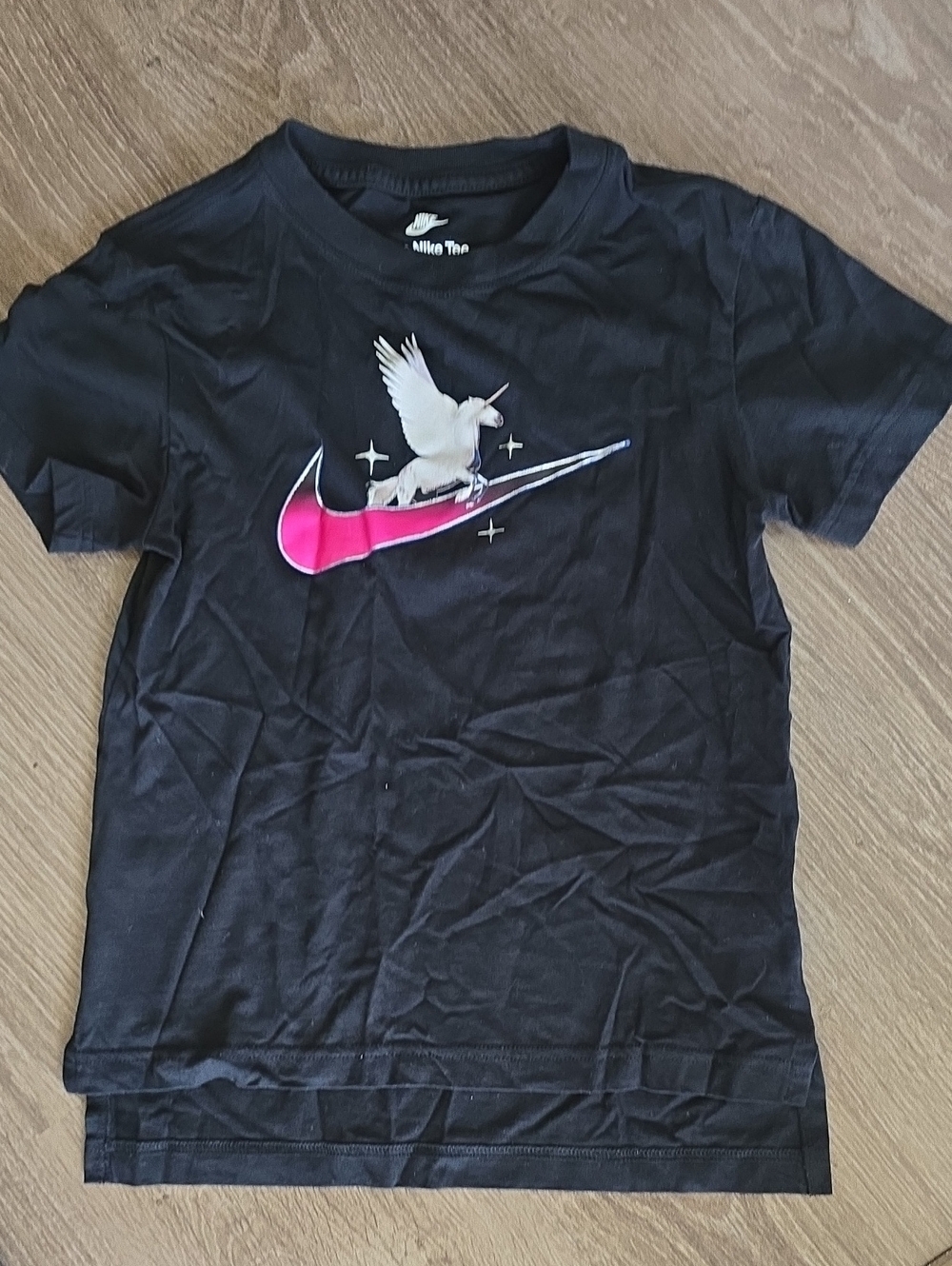Nike Black Kids Tee with Pink Swoosh and White Dove